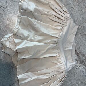Women’s Cream Tennis Skort with Pleated Overlay